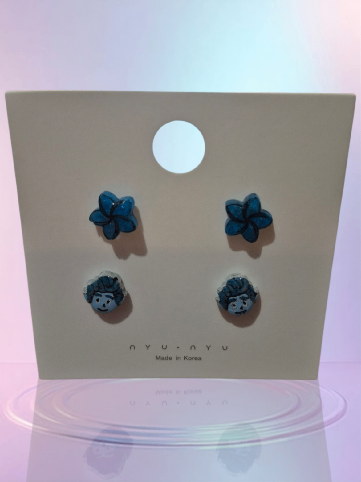 On ward and flower stud earrings